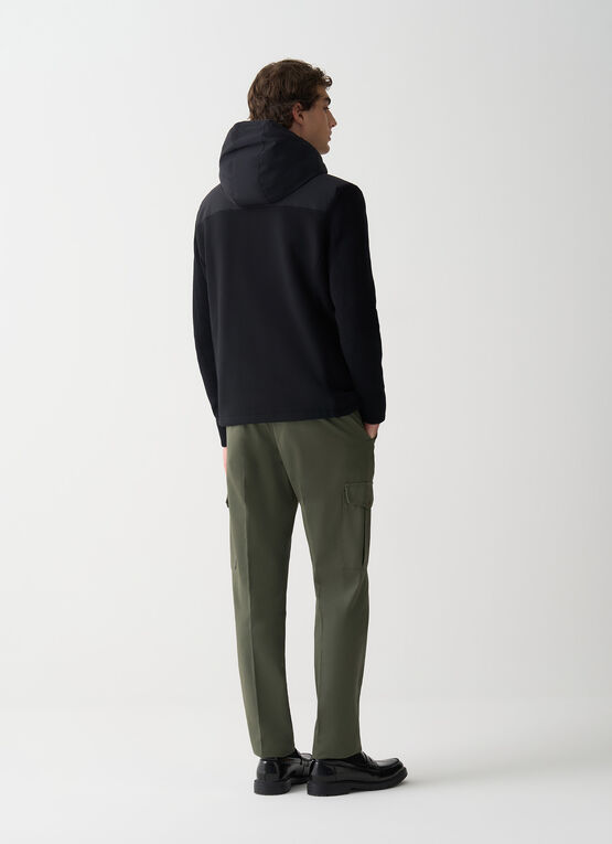 Padded jacket with knit sleeves 