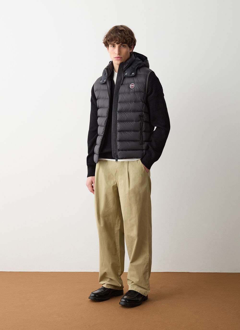 Down vest with detachable hood image number 1