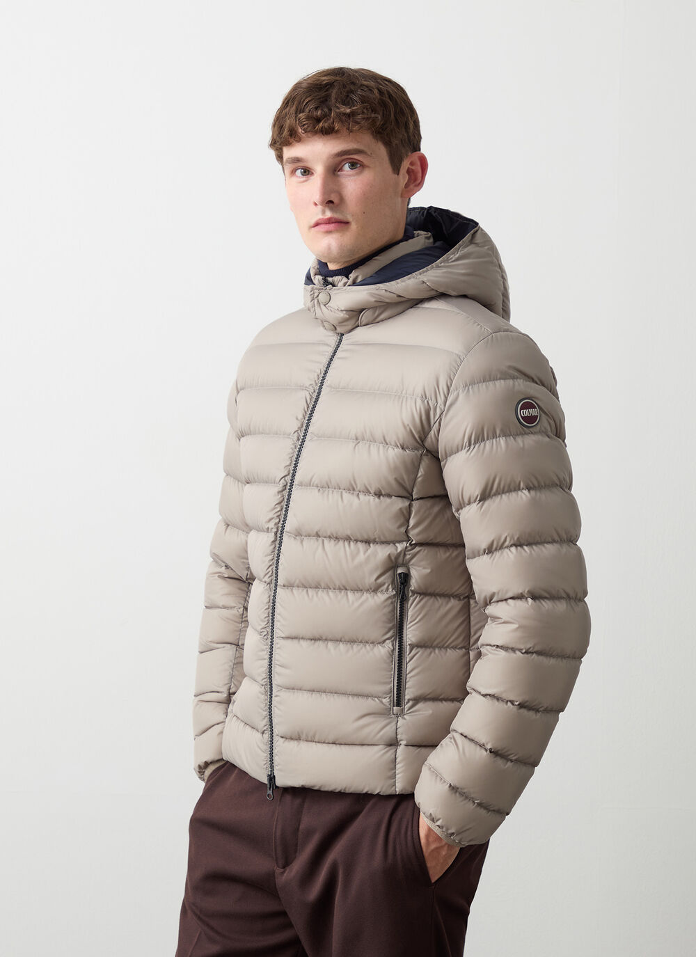 Sporty down jacket with detachable hood image number 0