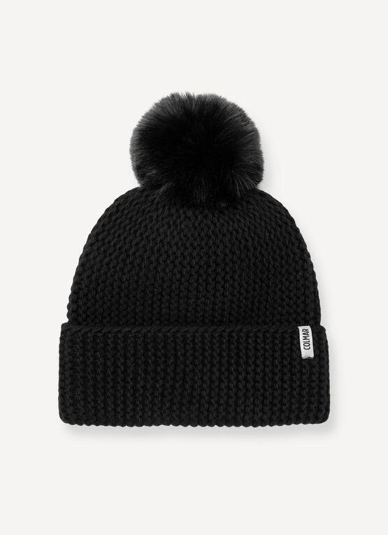 Women's hat with faux fur pom-pom