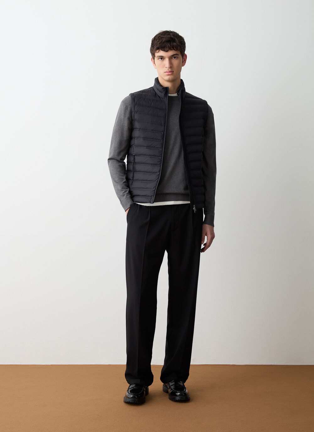 Down vest with seamless quilting image number 0