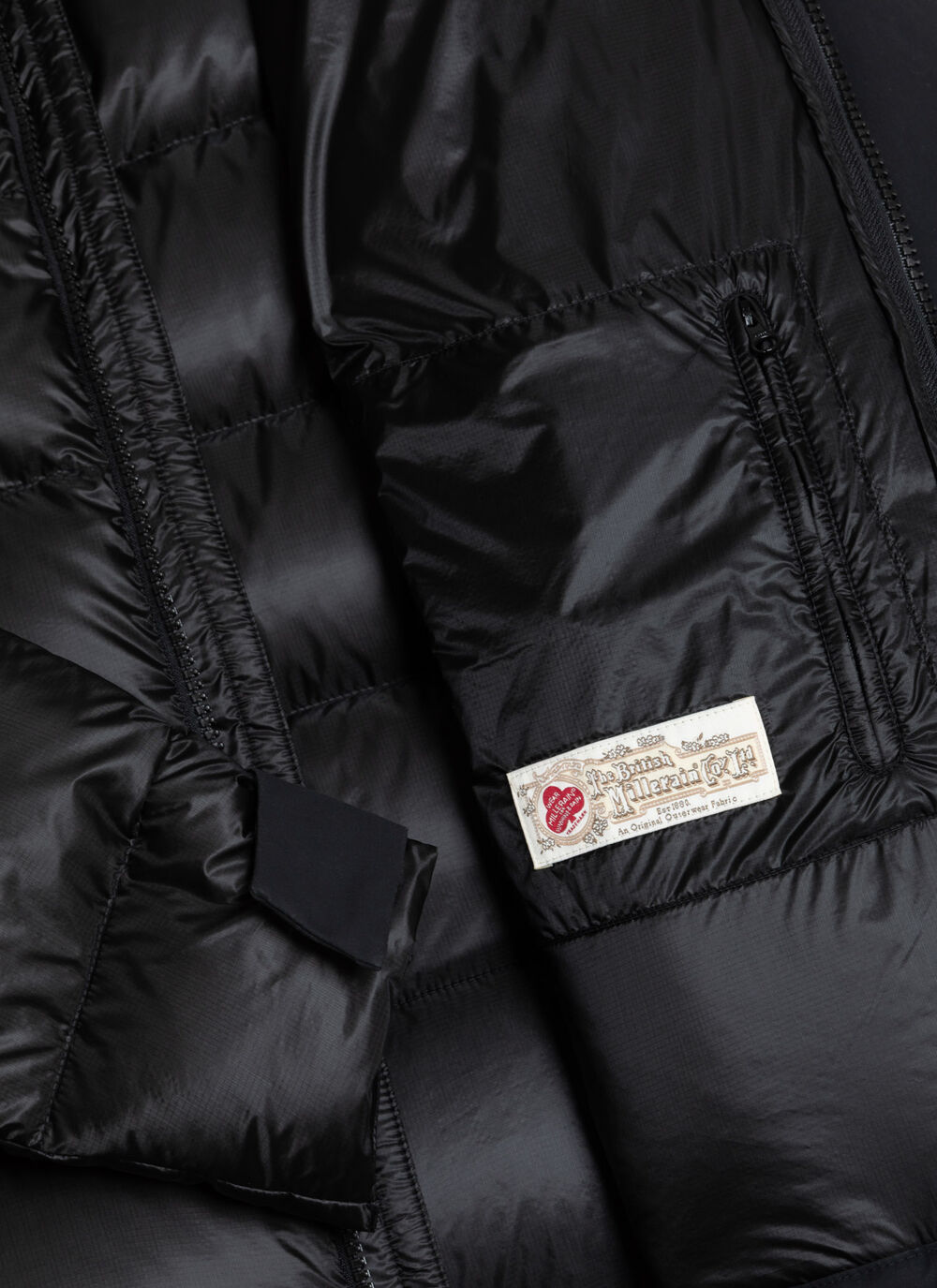 Down jacket with waxed sleeves image number 6