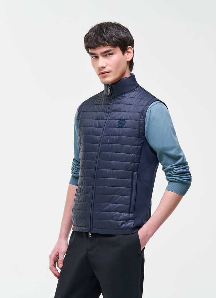 Vest with knit inserts