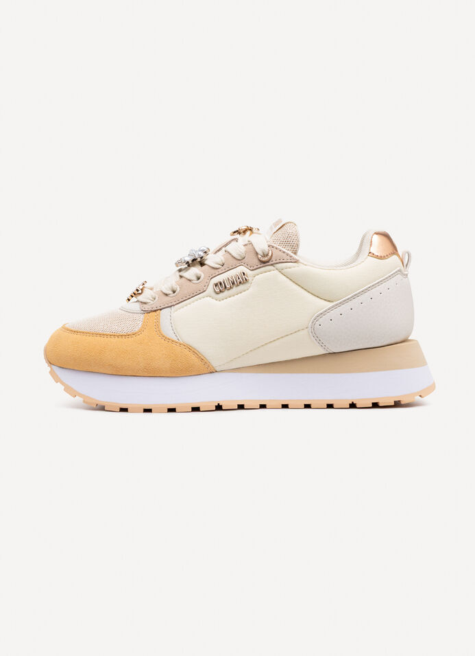 Zapatillas de mujer Travis Fancy suela alta