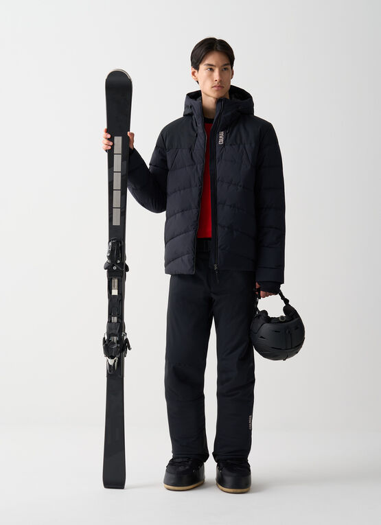 Ski gloves with stretch inserts