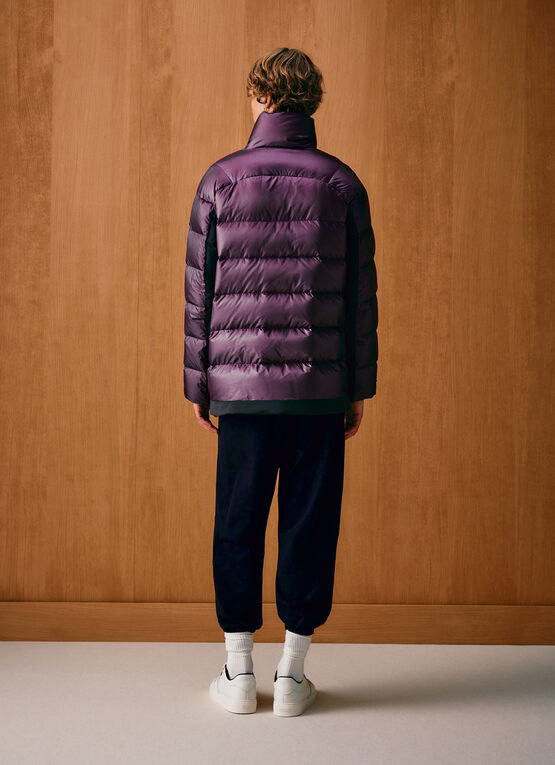 Down jacket with technical fabric details