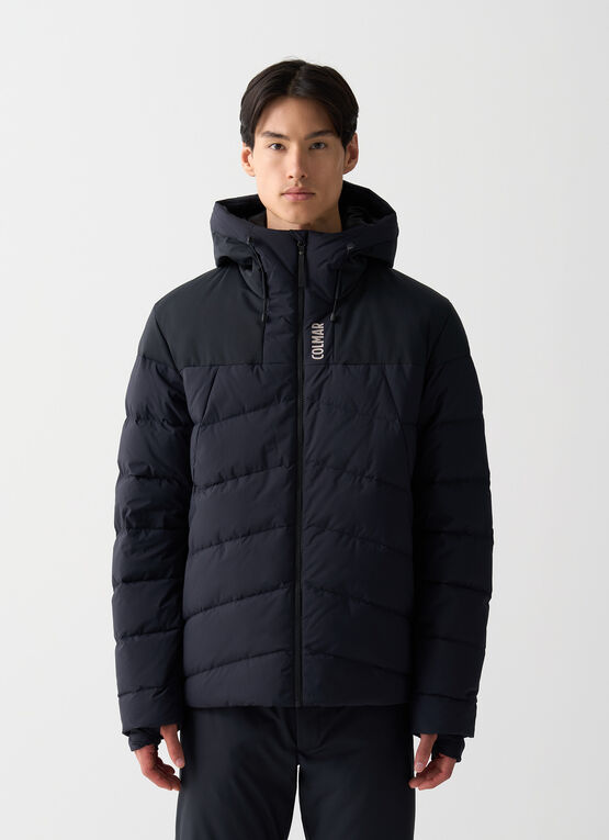 Ski gloves with stretch inserts