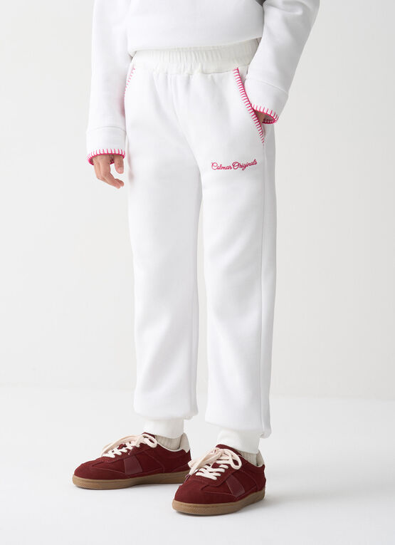 Tracksuit bottoms with embroidery
