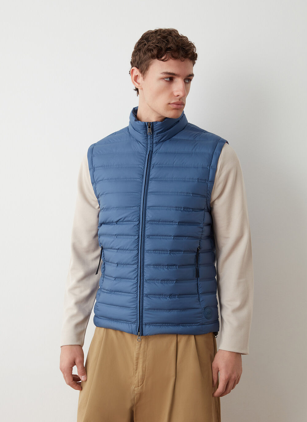 Down vest with seamless quilting image number 0