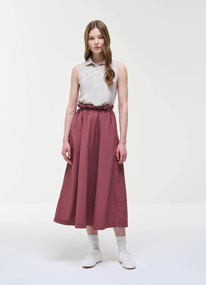 Sleeveless cotton piqu&eacute; polo shirt